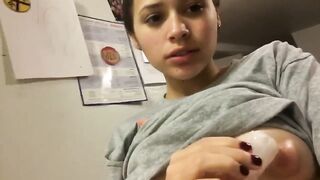 Young Teenie Kasey Kate putting ice on her perky swollen nipples